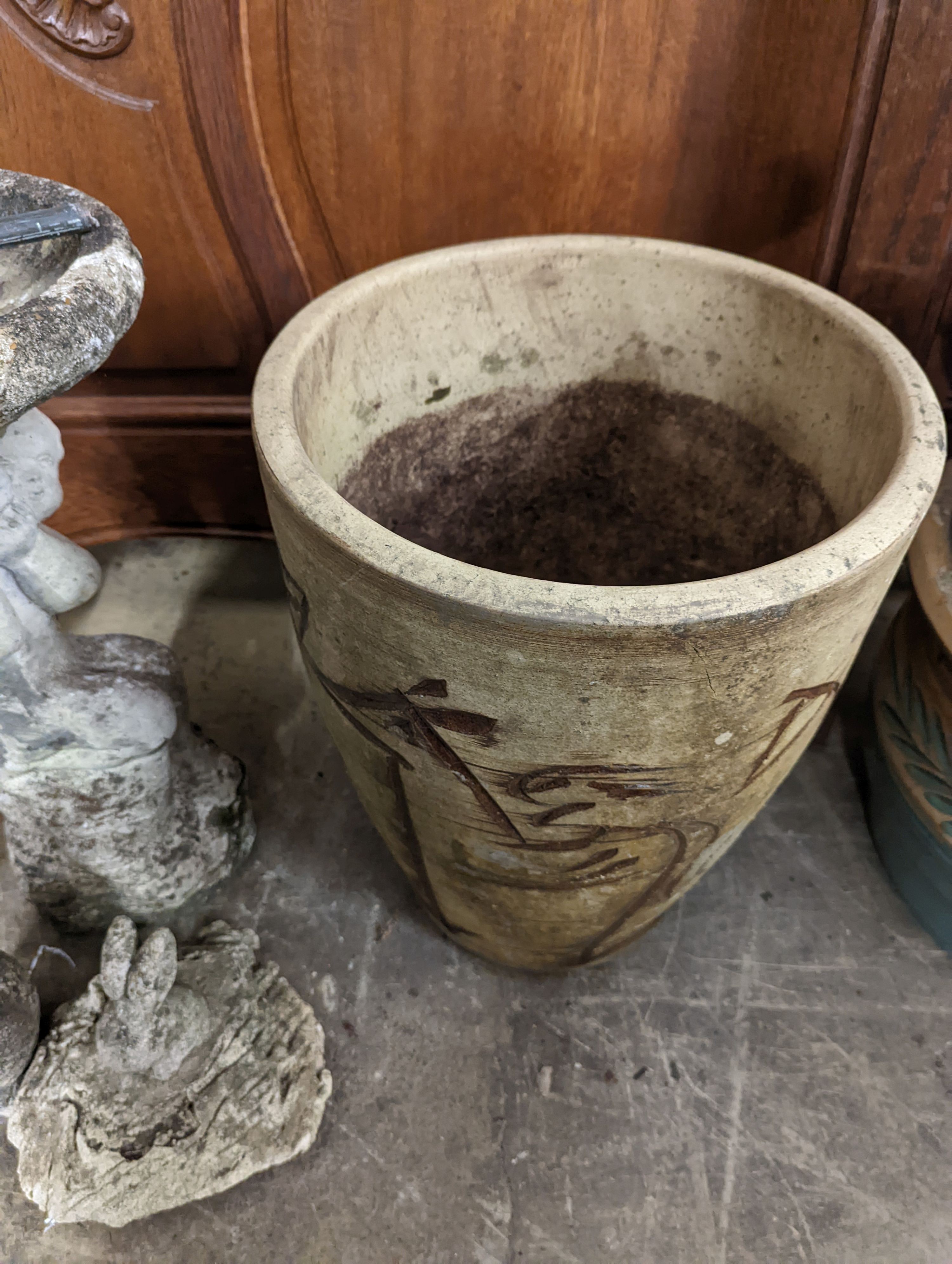 Three earthenware garden planters, largest height 50cm